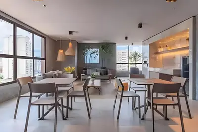 Uma área de estar em Flat de alto padrão no J Smart José Vilar #303