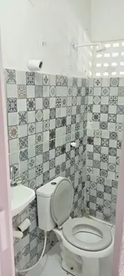 Uma casa de banho em Pousada Refúgio Praia & Café
