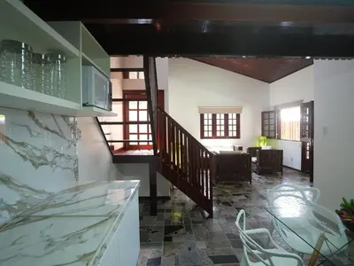 Uma área de estar em Beachfront Retreat with Pool and Garden