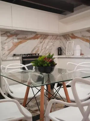 A cozinha ou kitchenette de Beachfront Retreat with Pool and Garden