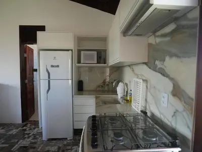 A cozinha ou kitchenette de Beachfront Studio with Pool Caponga