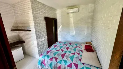 Uma cama ou camas num quarto em Mango Village Paracuru CE