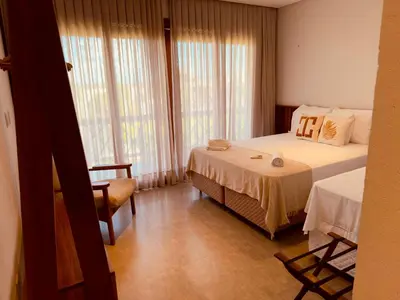Uma cama ou camas num quarto em Beachousebrazil - Luxury Beach Vila Praia do Preá