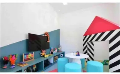 Uma televisão e/ou sistema de entretenimento em Apartamento Novo Vista para o Mar de Fortaleza