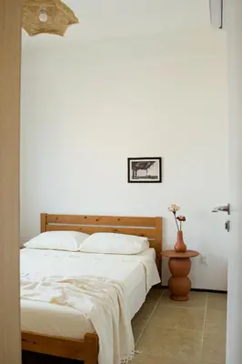 Uma cama ou camas num quarto em Ap Futurinho