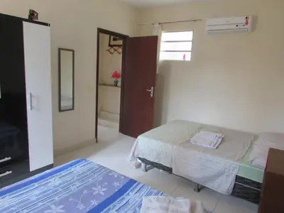 Uma cama ou camas num quarto em Apartamentos Veneza