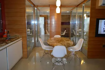 Uma televisão e/ou sistema de entretenimento em Apartamento Fortaleza Beira Mar