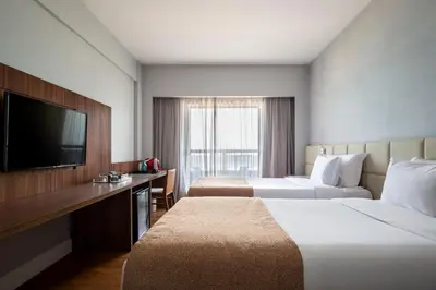 Uma cama ou camas num quarto em Hotel Gran Marquise