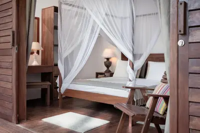 Uma cama ou camas num quarto em Villa Métisse