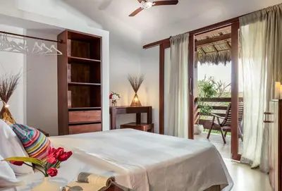 Uma cama ou camas num quarto em Villa Métisse