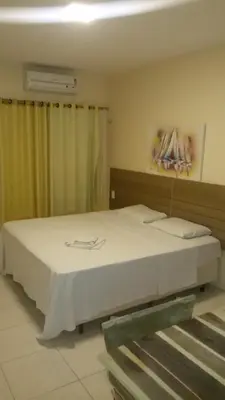 Uma cama ou camas num quarto em Quarto Ponte Metálica 105