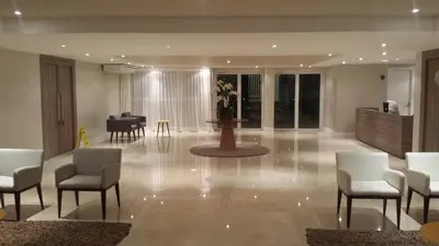 Uma área de estar em VG Fun Residence