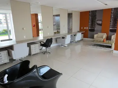 Uma área de estar em Beach Village Residence