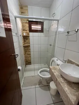Uma casa de banho em Pousada Dunas Beach