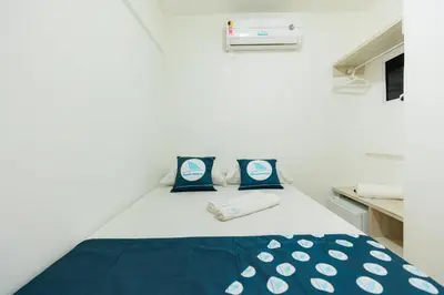 Uma cama ou camas num quarto em Pousada Meireles