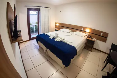 Uma cama ou camas num quarto em Pousada Mar Aberto