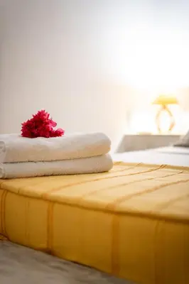 Uma cama ou camas num quarto em casa jasmin