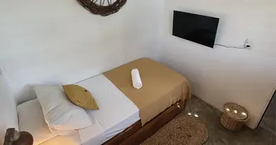 Uma cama ou camas num quarto em Mandala Hostel Jeri