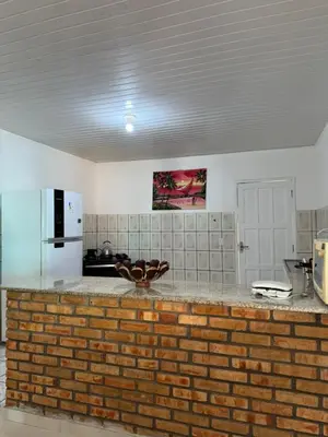 A cozinha ou kitchenette de House Beach Canoa
