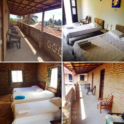 Uma cama ou camas num quarto em Pousada Sol e Mar
