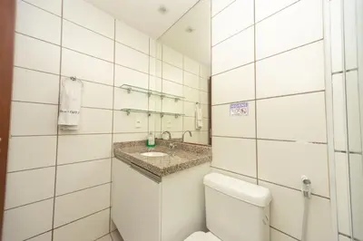 Uma casa de banho em Apartamento em Fortaleza Beach Class-uma quadra Praia