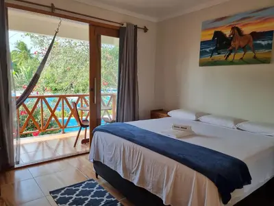 Uma cama ou camas num quarto em Pousada e Restaurante Paraíso Natural