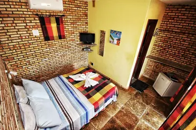 Uma cama ou camas num quarto em Mar à vista