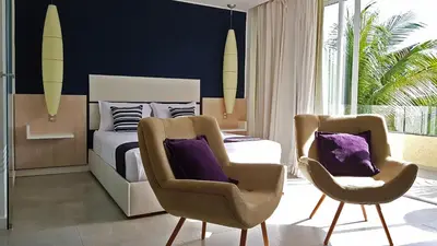 Uma área de estar em Ravenala Hotel Boutique