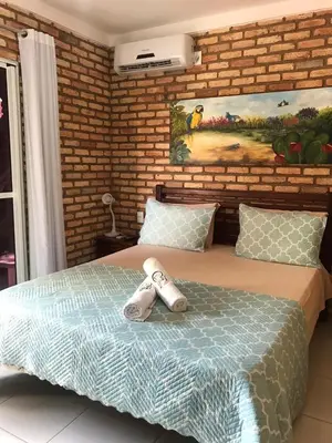 Uma cama ou camas num quarto em Chacara do Alemao