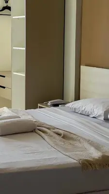 Uma cama ou camas num quarto em Hotel Boreas