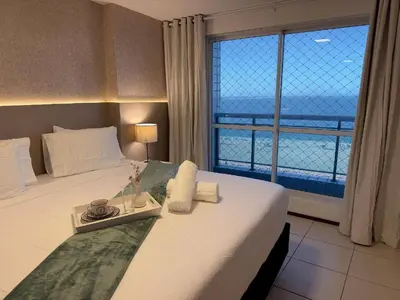 Uma cama ou camas num quarto em Terraços do Atlantico - Beira mar de Iracema