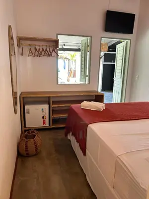 Uma cama ou camas num quarto em Cabaré Du Vento