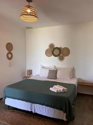 Uma cama ou camas num quarto em Cabaré Du Vento