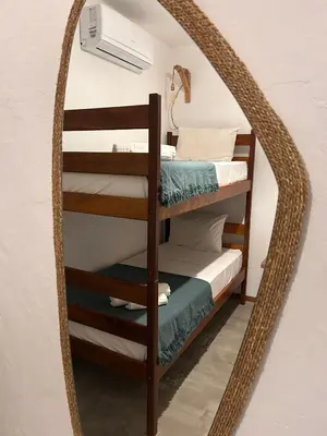 Uma cama ou camas num quarto em Cabaré Du Vento