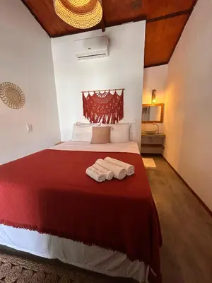 Uma cama ou camas num quarto em Cabaré Du Vento