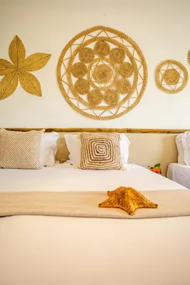 Uma cama ou camas num quarto em Preá Kite House