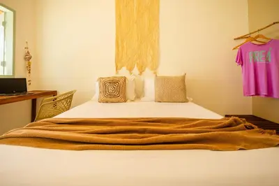 Uma cama ou camas num quarto em Preá Kite House