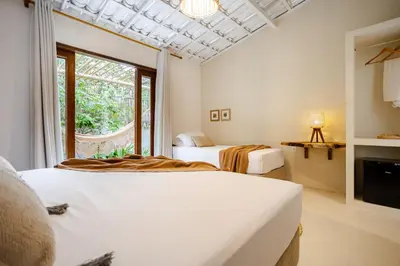 Uma cama ou camas num quarto em Preá Kite House