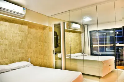 Uma cama ou camas num quarto em Apartamento na Beira Mar de Fortaleza - Edifício Landscape