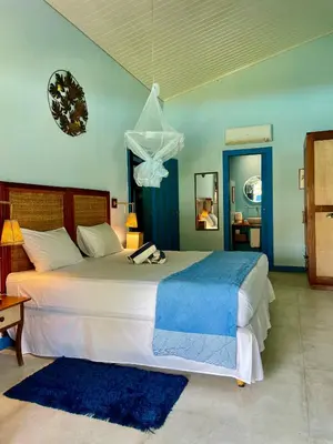 Uma cama ou camas num quarto em Vila Stella Cadente