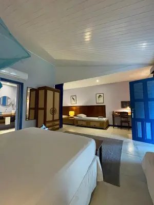 Uma cama ou camas num quarto em Vila Stella Cadente