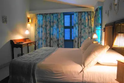 Uma cama ou camas num quarto em Vila Stella Cadente