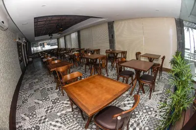 Uma área de estar em Genus Beach Hotel