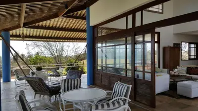 Uma área de estar em Casa de Praia em Mundaú