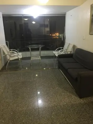 Uma área de estar em Flat Vista Completa Beira Mar