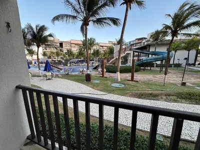 A área de jogos para crianças em Beach Living, Frente mar, Vizinho B Park - Oficial