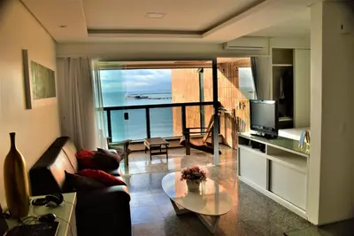 Uma televisão e/ou sistema de entretenimento em Seaflats Iracema Residence