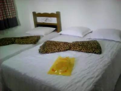 Uma cama ou camas num quarto em Chalet Schönenberg