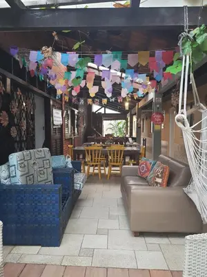 Uma área de estar em Pousada Casa da Lucinha