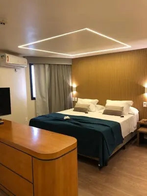 Uma cama ou camas num quarto em Fortaleza 703--Fortaleza 713